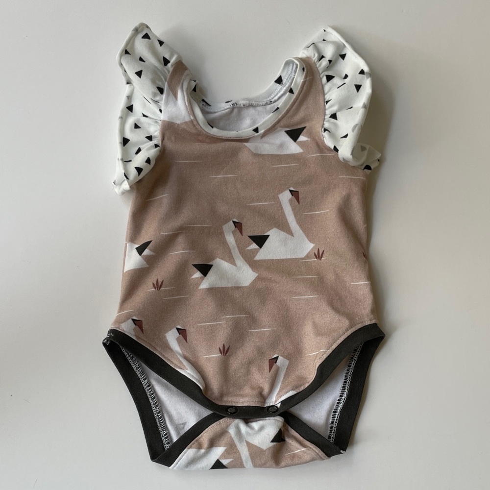 Swan Print dressy Onesie - dusty pink + black (size NB - 1m)
